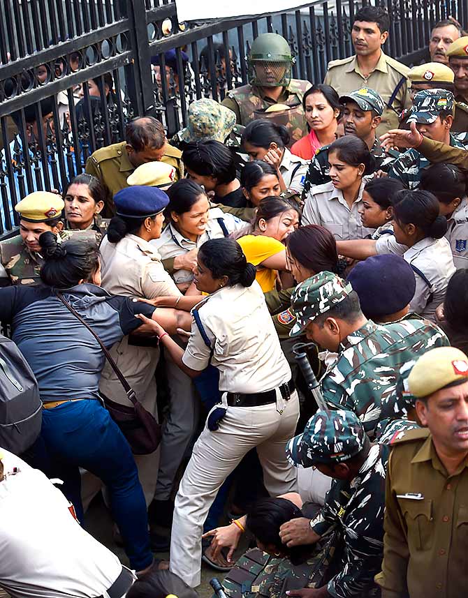  Police stop students from entering the AICTE. Photograph: Kamal Singh/PTI Photo