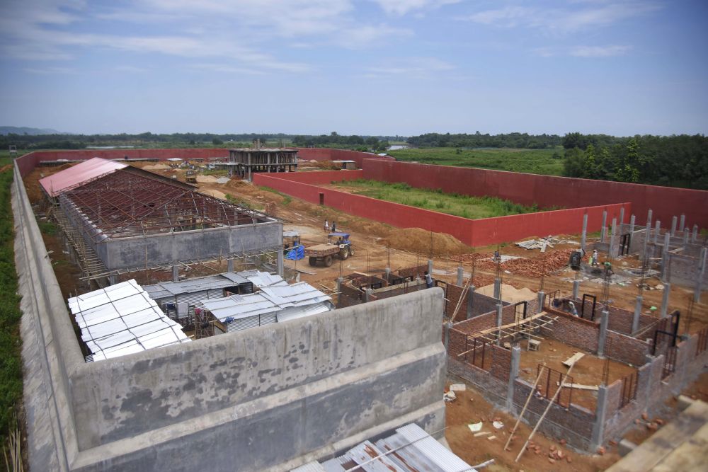 Labourers work at a construction site of a detention centre for illegal immigrants at a village in Goalpara district in the northeastern state of Assam, India, September 1, 2019. Picture taken  September 1, 2019. REUTERS/Anuwar Hazarika