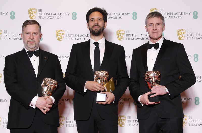 Greg Butler, Guillaume Rocheron, Dominic Tuohy pose with their awards for Special Visual Effects for '1917' at the British Academy of Film and Television Awards (BAFTA) at the Royal Albert Hall in London, Britain, February 2, 2020. REUTERS/Toby Melville